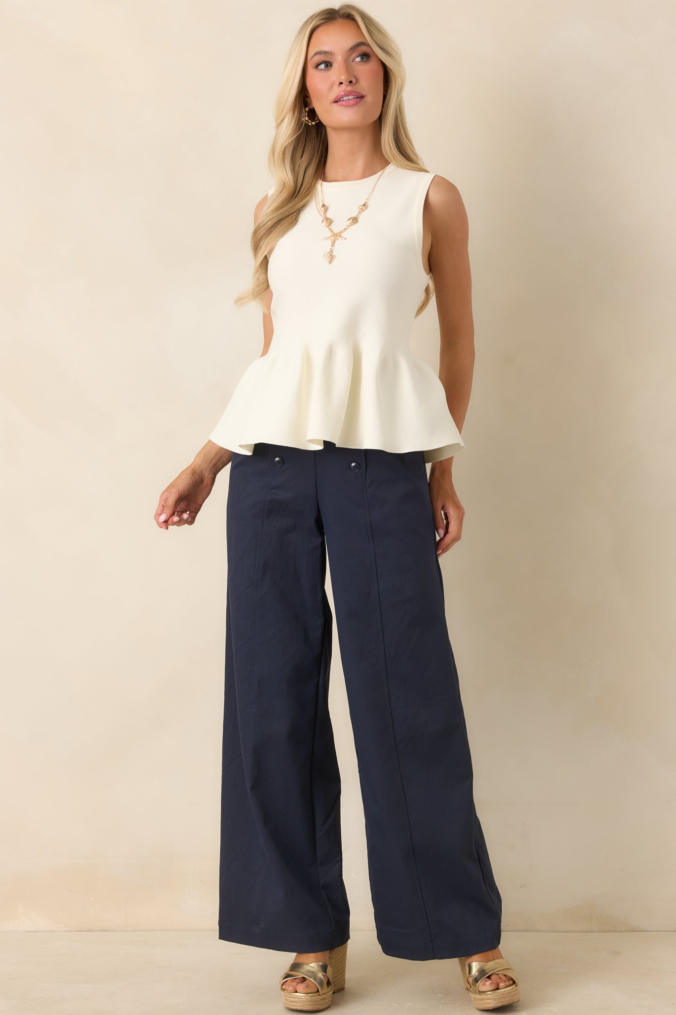 It Just Works Ivory Knit Sleeveless Peplum Top