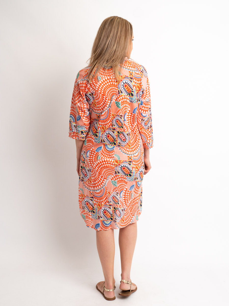 Knee-length Pleated Dress with Subtle Frills and 3/4 Raglan Sleeve in Orange Geo