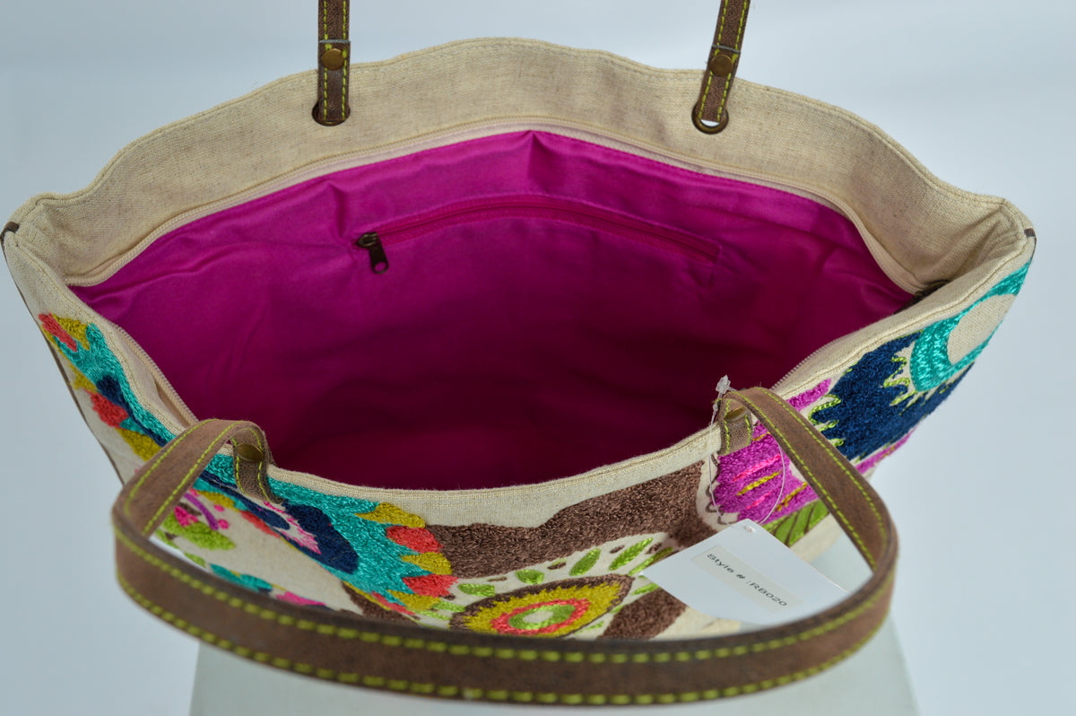 Beautifully embroidered canvas tote bag with leather handles
