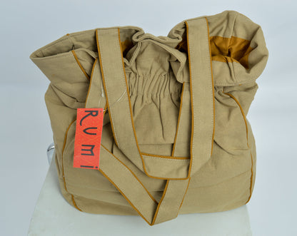 Beautiful casement bag colourfully decorated with embroidery and applique