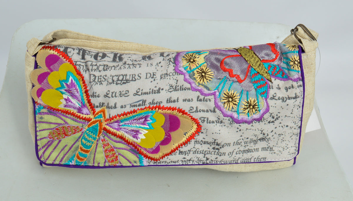 Attractive butterfly feathered shoulder bag with butterfly themed applique and embroidery
