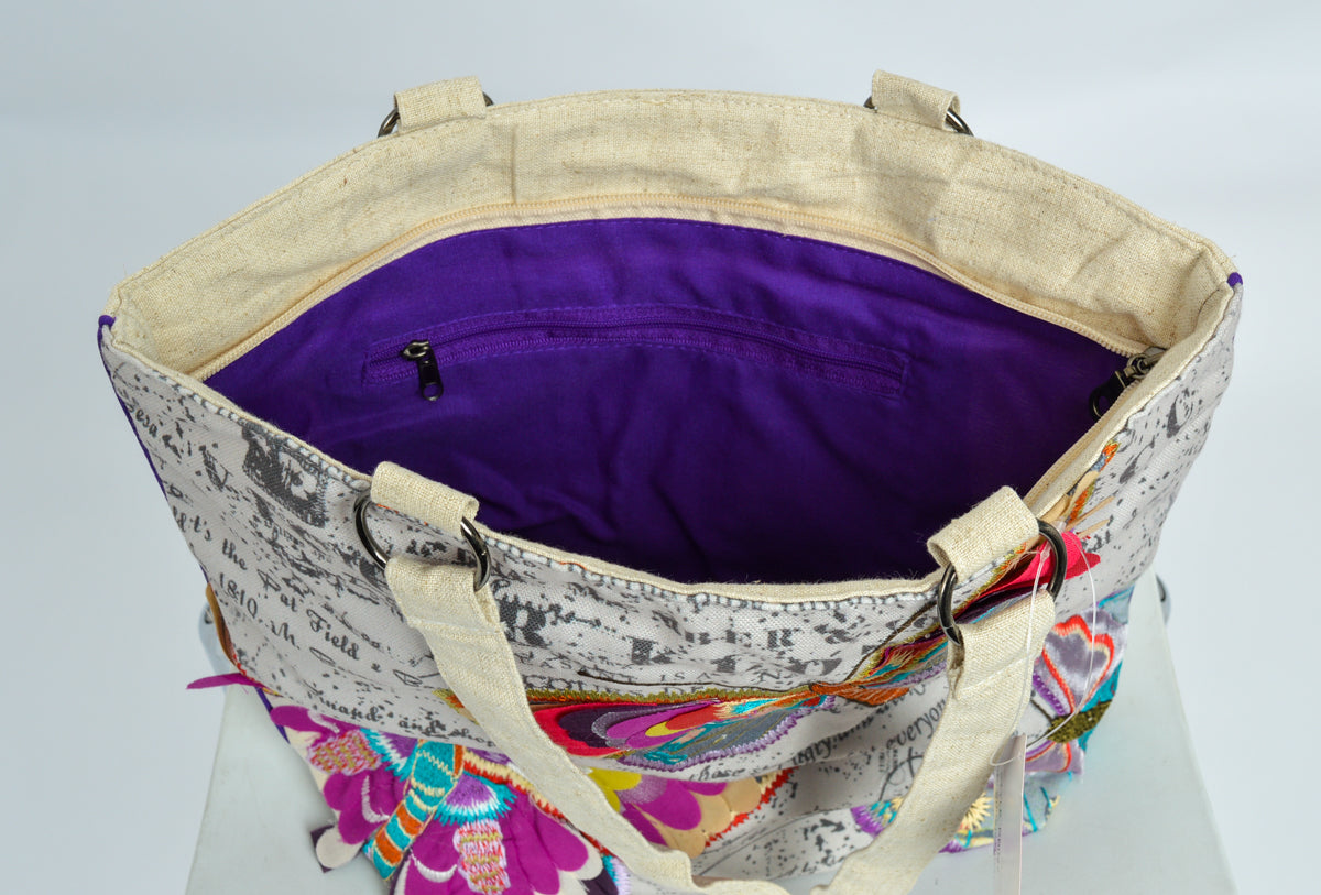 Attractive butterfly feathered tote bag with butterfly themed funky applique and embroidery